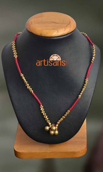 Tribal Jewellery - Necklace with golden pendant on red thread