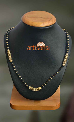 Tribal Jewellery - Necklace with half cut beads on black thread