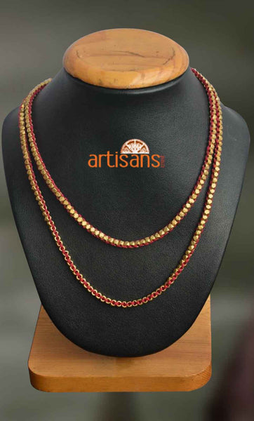 Tribal Jewellery - Necklace with half cut beads on red thread