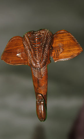Wood carved elephant head as wall hanging