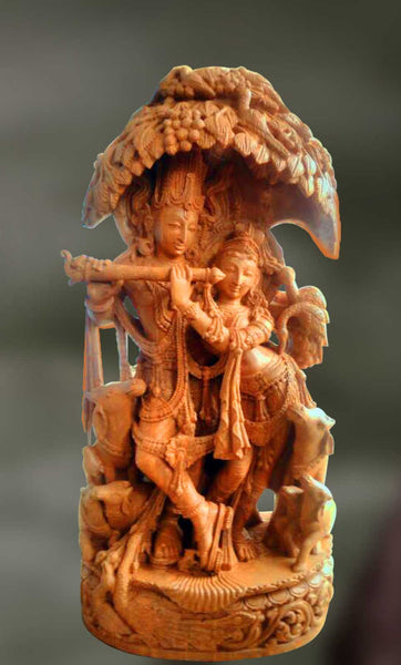Handcrafted sandstone sculpture of Lord Krishna and Radha