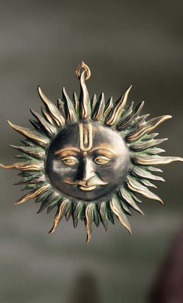 Brass wall hanging of the Sun God