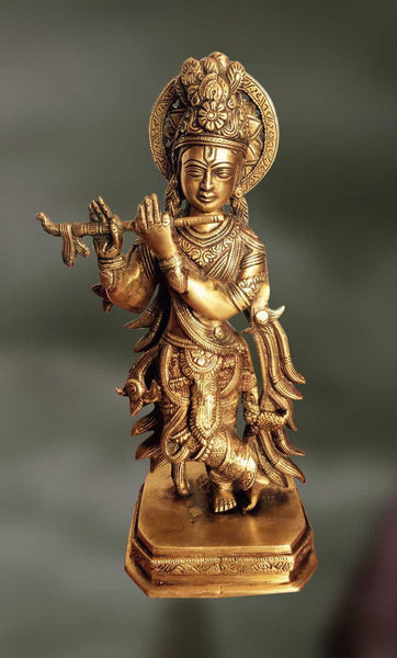 Brass sculpture of Krishna playing his divine flute