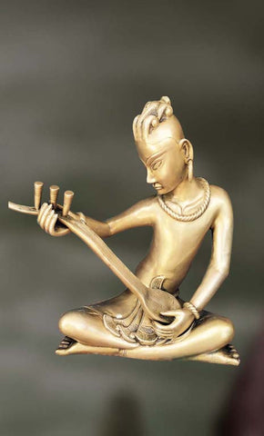 Brass Sculpture of man playing veena 