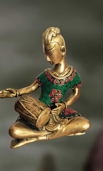 Brass and Stone sculpture of man playing Indian drum