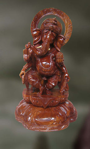 Wood sculpture of dancing Ganesha