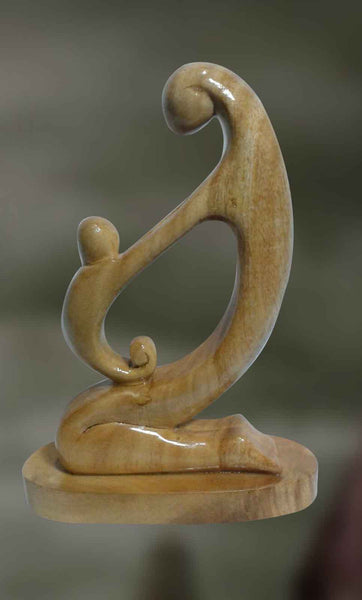Wood sculpture of mother and child