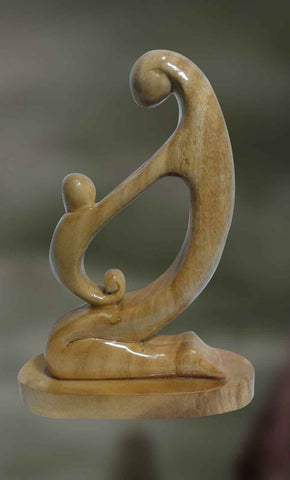 Wood sculpture of mother and child