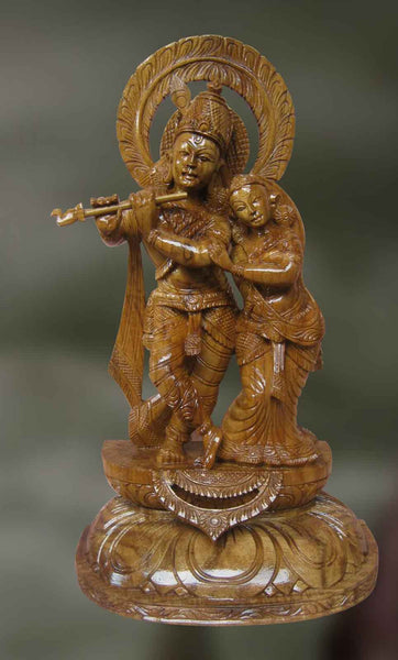 Wood sculpture of Radha and Krishna together 