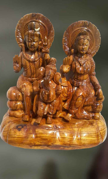Wood sculpture of Lord Shiva and Goddess Parvati blessing