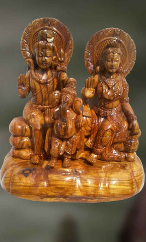 Wood sculpture of Lord Shiva and Goddess Parvati blessing