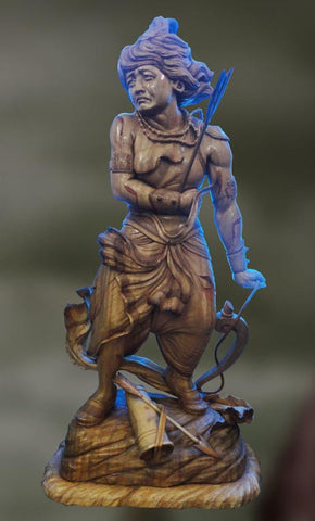 Wood sculpture of Warrior Prince Abhimanyu in the battle of Mahabharata